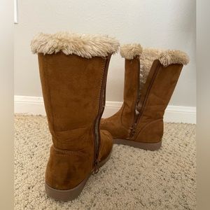 Used. Cat and Jack brown boots. Normal kids wear and tear